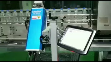 Leadjet 30w CO2 laser marking machine on the PET bottle production line 21000 btl/hour 2 lines