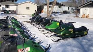 My brother and his 1975 JD600 parking along side the other snowmobiles
