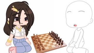 my friend teaching me to play chess: