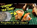 Breaking the bank busting into an antique piggy bank stuffed with old coins forgotten for 80yrs