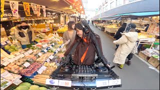 Walking DJ at the Sendai morning market/Playing The World