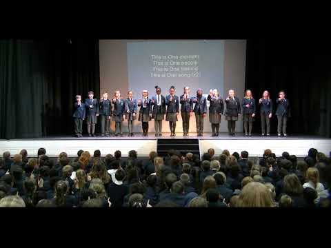 'One moment, one people' performed by The Premier Academy