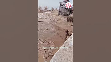 Ice | Excavators clear ice from a bridge