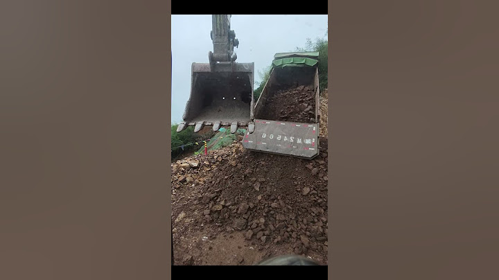 The Process Of Unloading Stones From A Truck