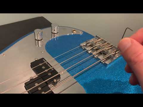 How to adjust string height on a bass guitar