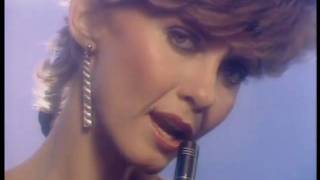 Video thumbnail of "Olivia Newton John - A Little More Love"