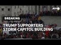 Trump supporters storm Capitol's steps; police evacuate Congress | AFP