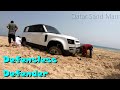 Land Rover Defender recovered from soft sand on coast of the Arabian Gulf in Qatar سيلين , العديد