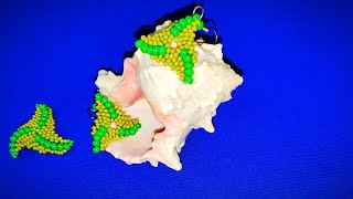 Треугольные серьги из бисера. Volumetric triangular beaded earrings. Треугольные серьги из бисера. Volumetric triangular beaded earrings.