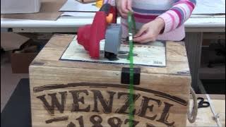 Strapping – Crate display, cord and poly strap with heat seal