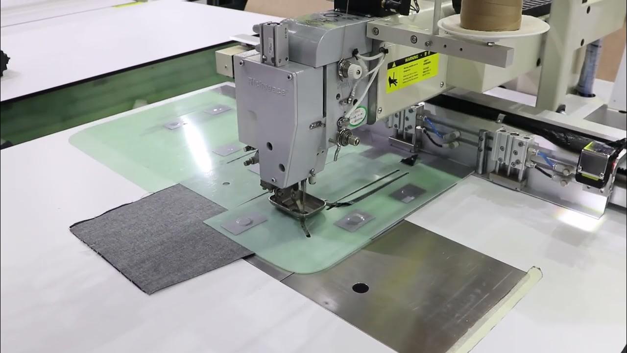 Using a fully automatic template sewing machine to sew zippers on jeans