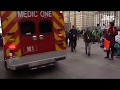 RAW: Protesters block an ambulance that appears to be responding to an emergency