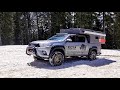 Toyota Hilux Revo con célula camper luchando contra el hielo de los Alpes en 4x4...