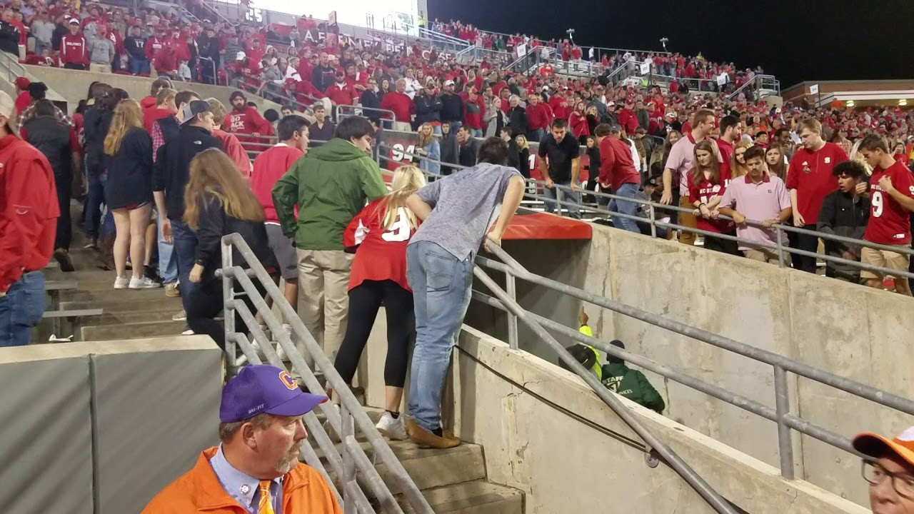 NC State fans throwing objects and spitting on refs YouTube
