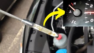 Can low transmission fluid cause engine overheating?