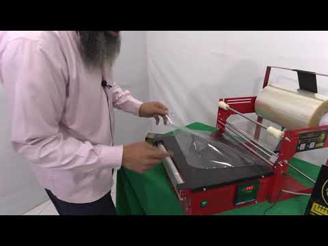 ماكينة السلوفان تغليف عبوات البرفان وغيرها الكثير