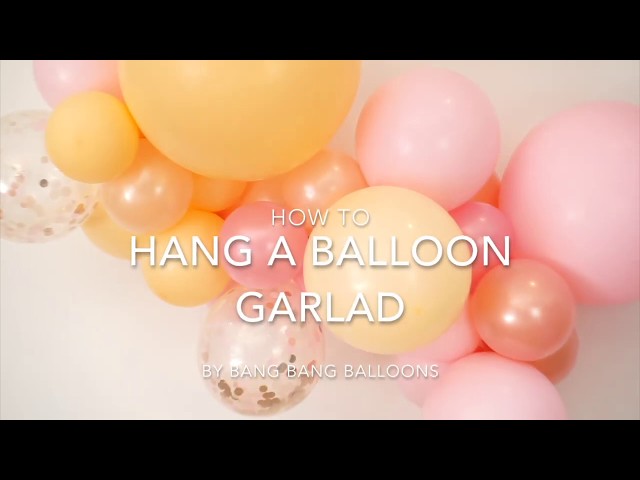 How to hang your balloon garland on a wall using command hooks