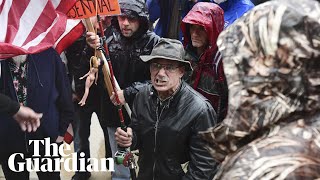 Armed coronavirus lockdown protesters clash at Michigan's state capitol