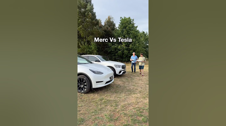 Where do you put your pizza in a Merc? 🍕 #tesla #mercedes #teslamodely #mercedesamg