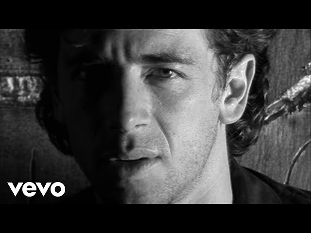 Patrick Bruel - Combien de murs... (Clip officiel)