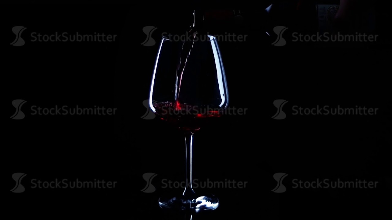 red wine pouring close up Stock Footage . Stock Footage