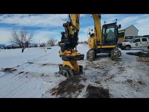 messing with the engcon grapples and just hooked onto the compactor to set pressures.