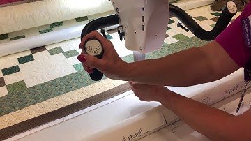 Attaching binding with a longarm