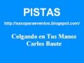 Pista y partitura de Colgando en tus manos de Carlos Baute