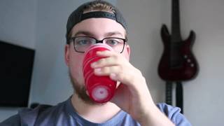 Guy Stares At Camera And Drinks From A Red Cup...IN 4K!!