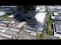 DRAMATIC footage shows HUGE Trafford Park fire as concerns about 'chemicals and oil drums nearby'