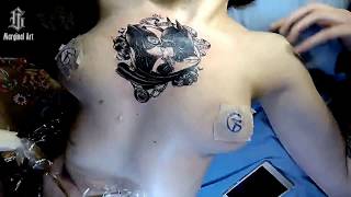 Бэтмен и женщина кошка на груди у красотки.Batman and the womany is a cat on the chest of a beauty. Бэтмен и женщина кошка на груди у красотки.Batman and the womany is a cat on the chest of a beauty.