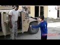 شجاعة طفل عراقي امام رتل أمريكي ويغلط على الجندي الأمريكي