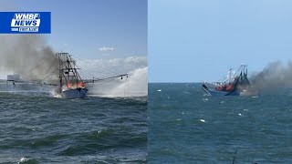 Crews respond after boat catches on fire off Cherry Grove coast