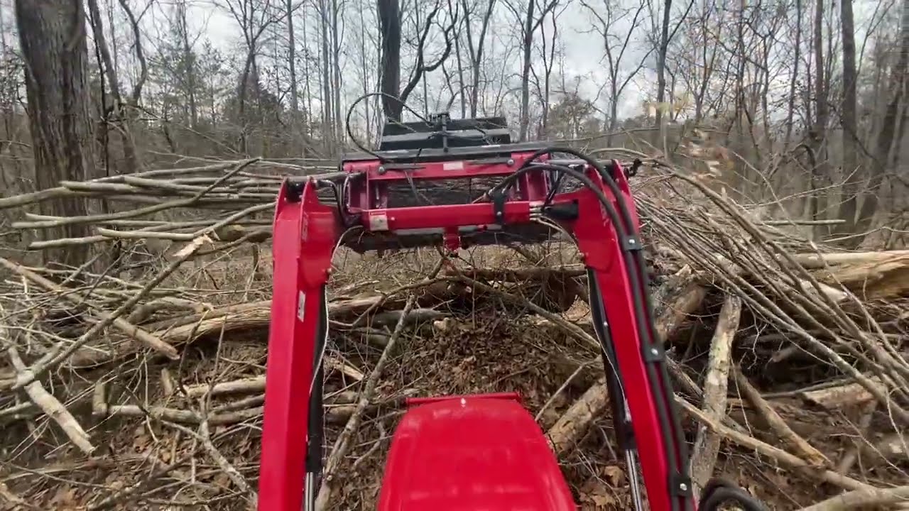 Crunch time cleaning up brush piles with Mahindra Tractor YouTube