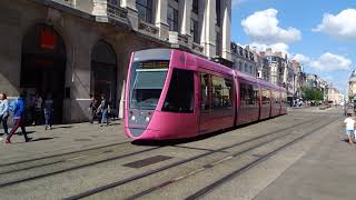 Pink Tram in Reims with ground-level power supply. tramway de Reims, Alimentation par Sol (APS).