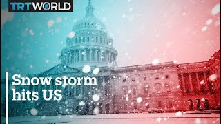 Eastern US hit by record freeze and heavy snow