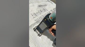 DOD large character handheld inkjet printer prints multiple lines of information on woven bags,