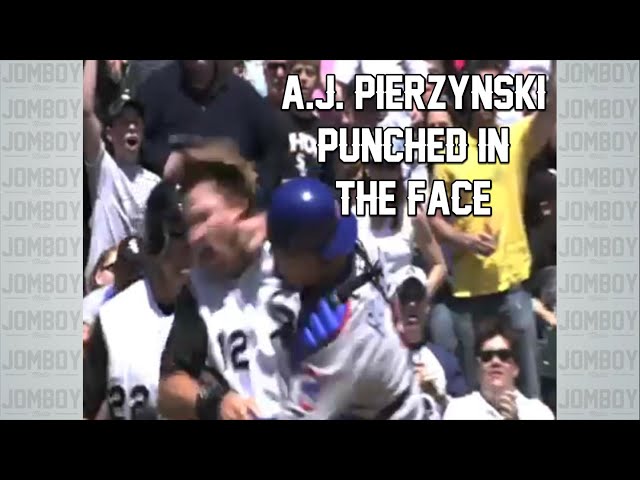 A.J. Pierzynski barrels Michael Barrett then gets punched in the face, a breakdown