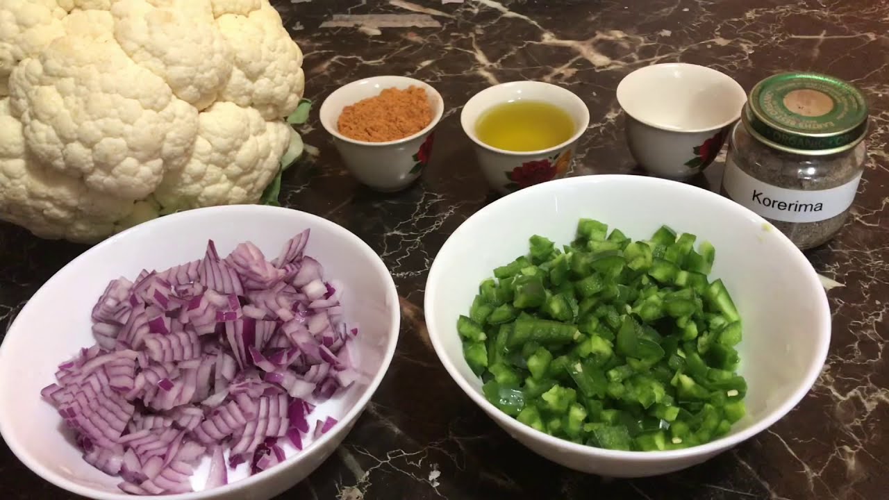 ዱለት ለምኔ - የአበባ ጎመን ዱለት - የፆም  Cauliflower with green pepper onions #HowtocookEthiopian #dulet #Vegan