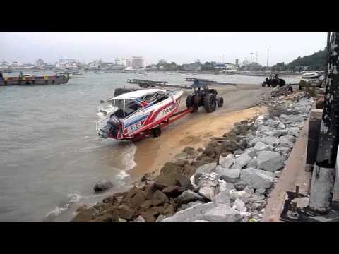 Thai Style Boat Landing at Pattaya Beach