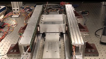 Magnetically Levitated Linear Stage for In-Vacuum Transportation Tasks