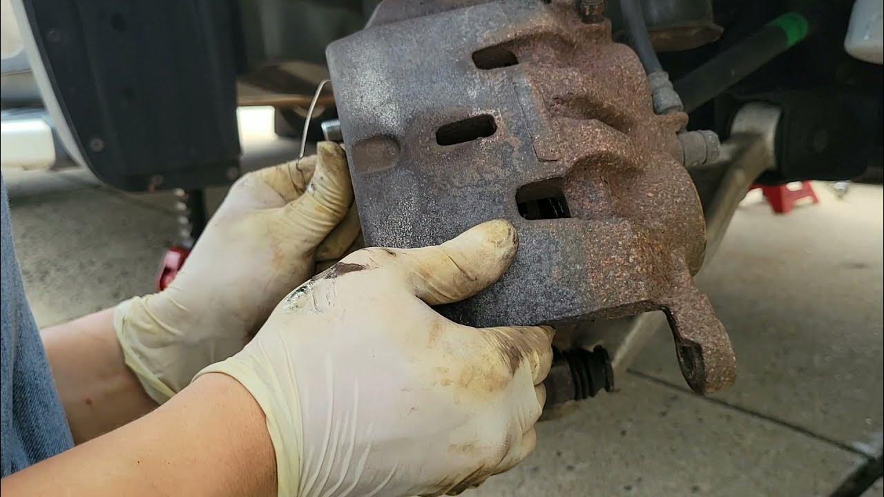 2 Gen Honda Pilot front brake job....easy - YouTube