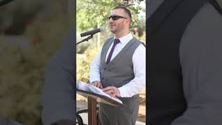Blind Man Reciting Quran With Braille
