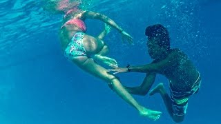 Girl & Boy Underwater.