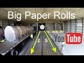 Picking up Paper Rolls being loaded on a truck