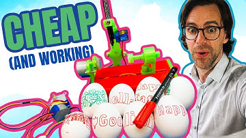 A robot is decorating our Easter eggs