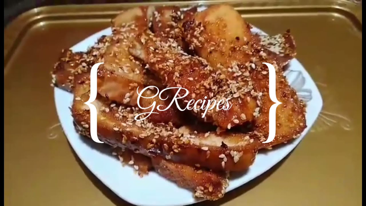 MAKE YUMMY SLICE TOAST BREAD WITH SESAME SEEDS.