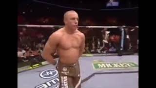 GSP rubes his hands on his shorts after touching gloves with Matt Serra