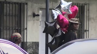 Police search for gunman after 2 people killed, 1 wounded
