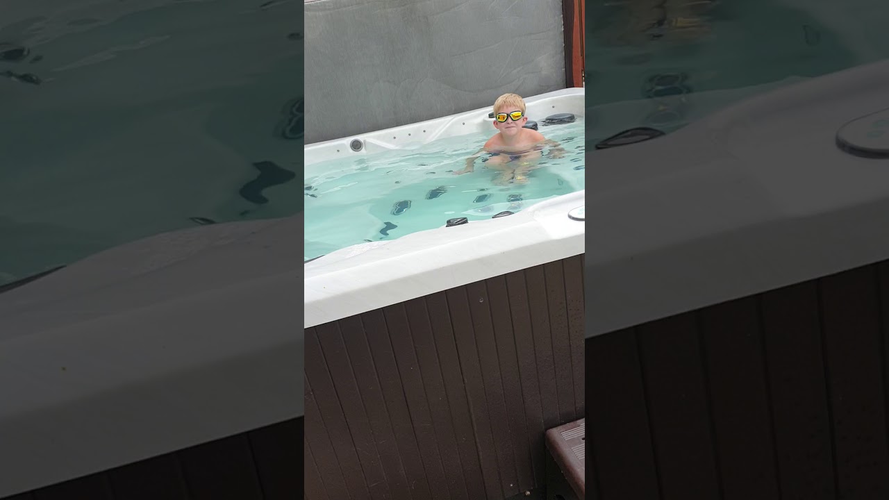 Hundreds of balls in the hot tub YouTube